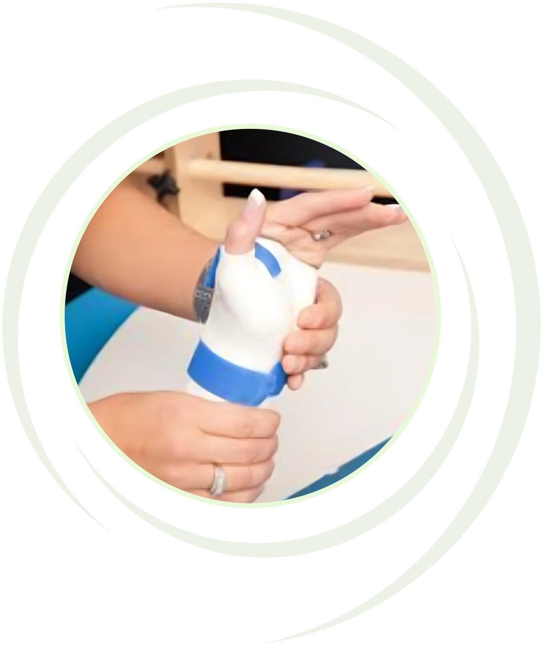 Hand with blue and white bandage.