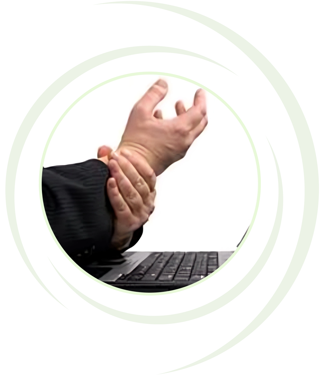 Person holding wrist near a keyboard.